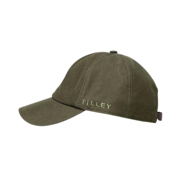 Casquette verte en coton ciré vue de côté avec le logo par tilley