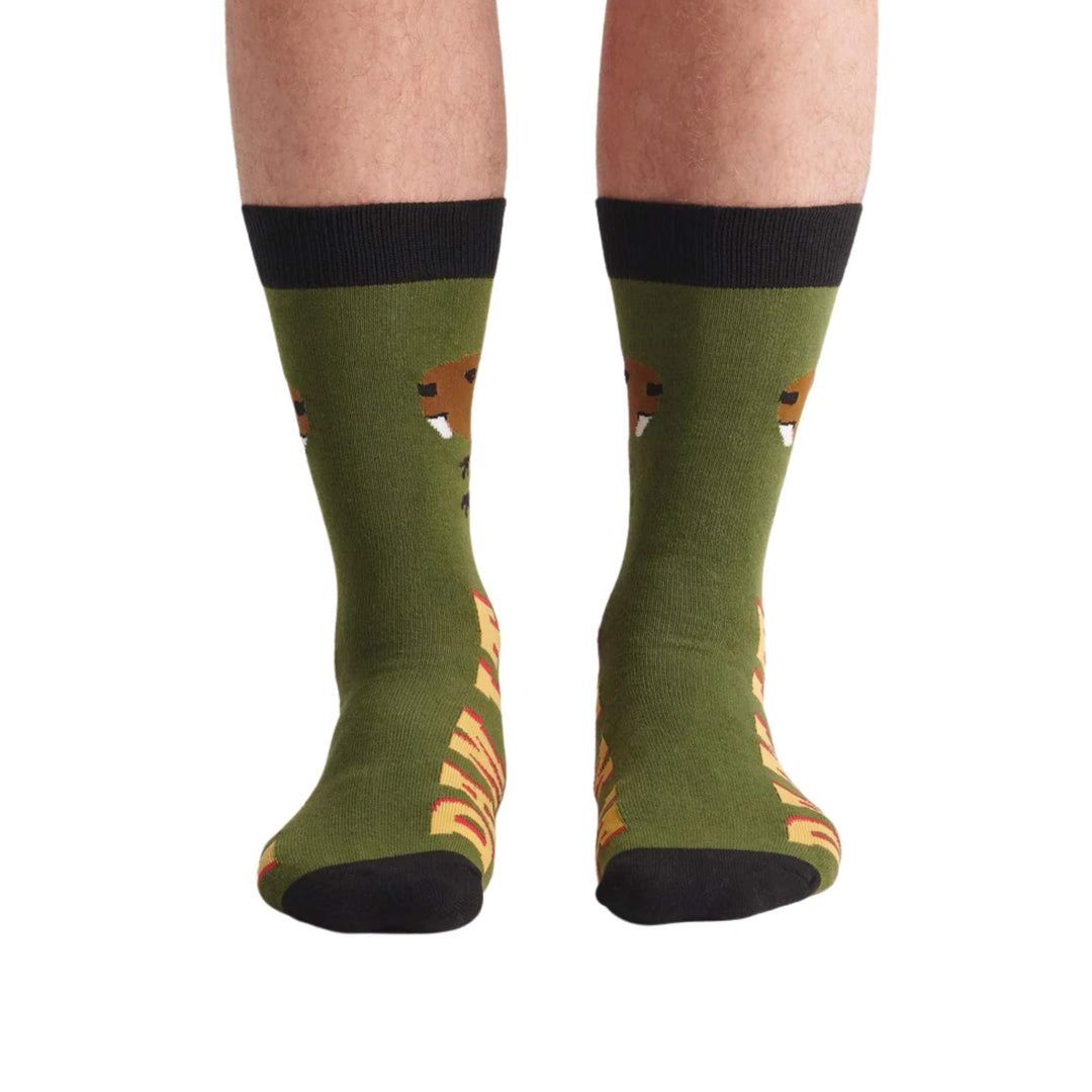 Chaussettes vertes avec un castor et Dam it d'écrit par La petite maison bleue vues de devant
