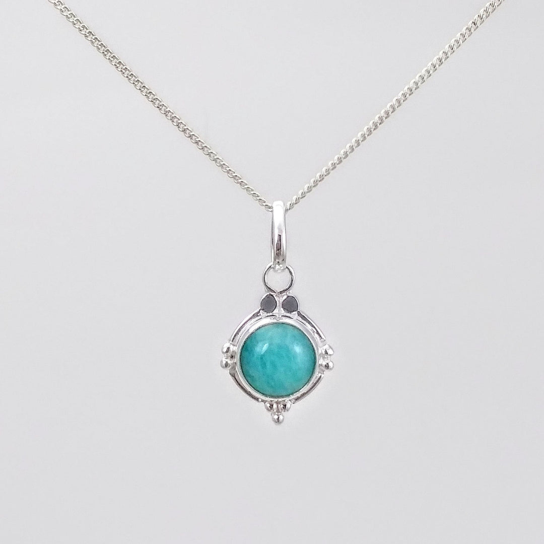 Pendentif avec une pierre amazonite couleur turquoise sertie sur argent