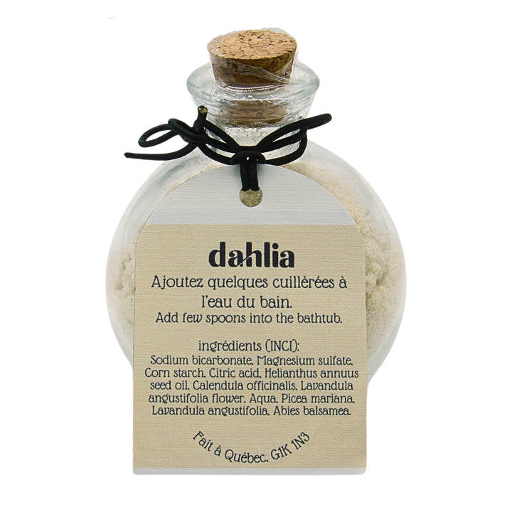 Flacon en verre de poudre de bain Forêt et flore par Dahlia vu de devant avec le derrière de l'étiquette