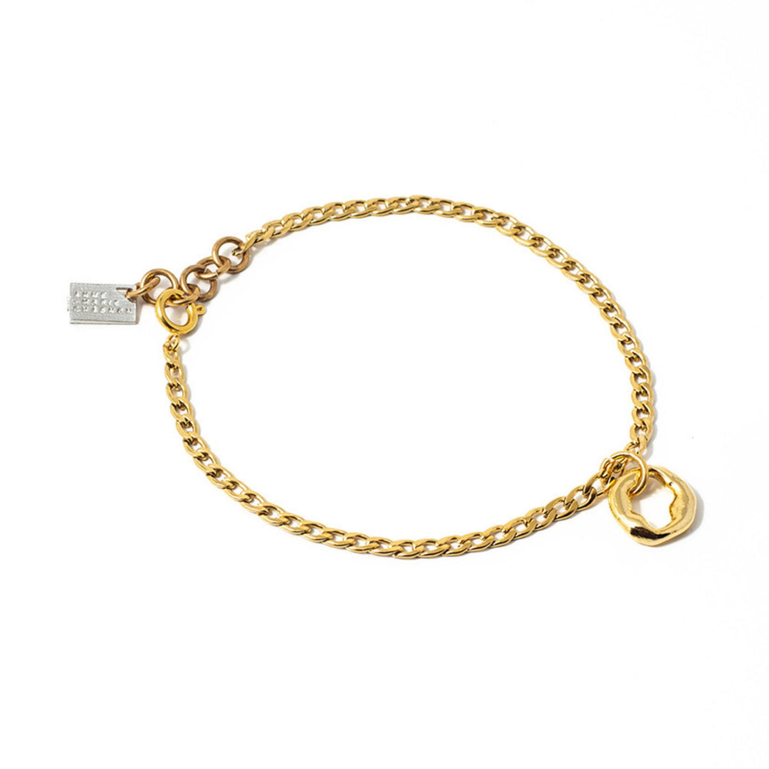 Bracelet pour chevi;;e Anne-Marie Chagnon Bazae doré avec breloque circulaire
