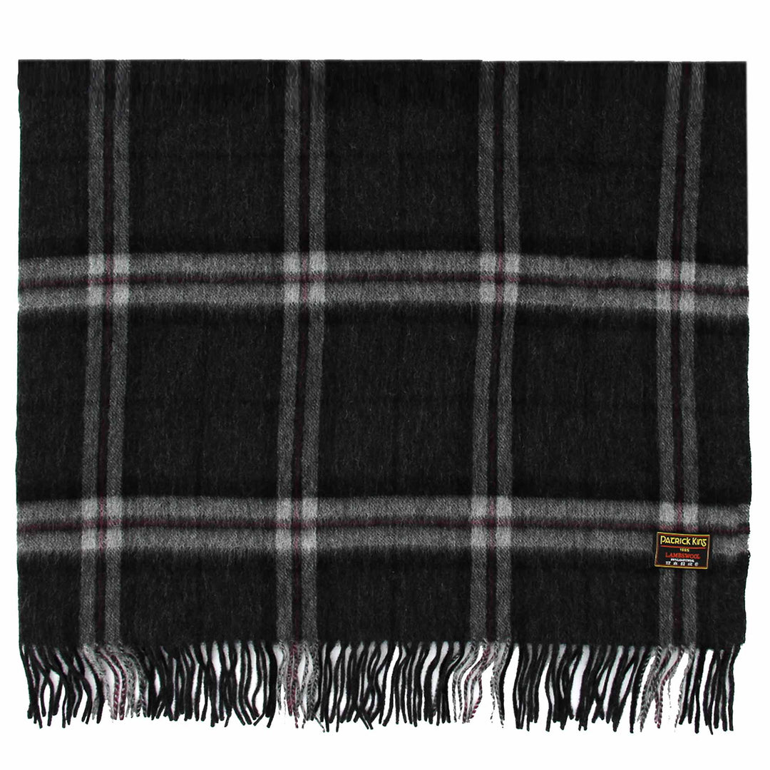 Étole en laine d'agneau avec le tartan Thompson Charcoal pliée avec les franches dans le bas