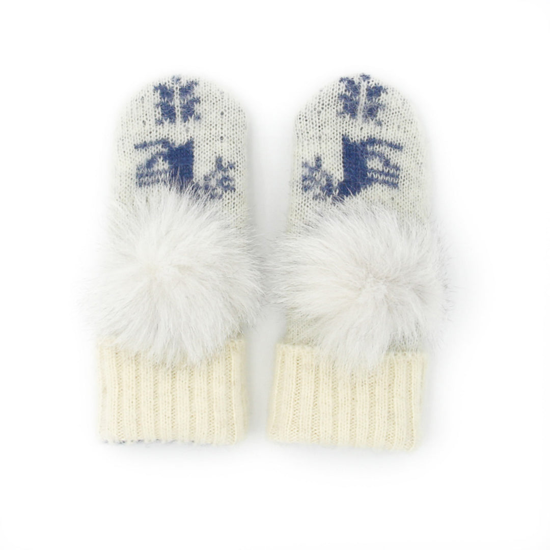Mitaines en laine islandaises blanches et bleues avec pompoms blanc sur le dessus vues de haut