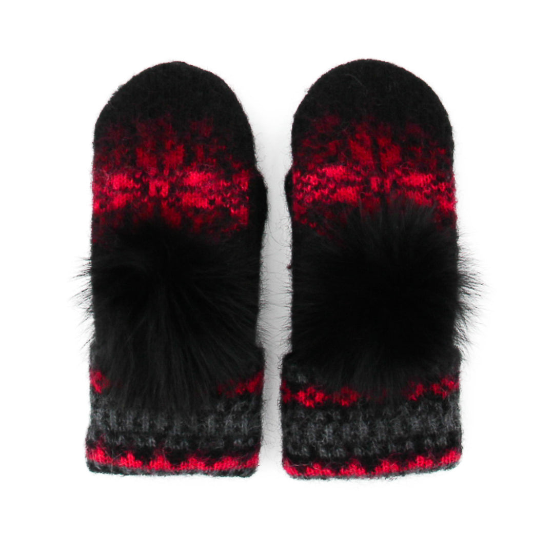 Mitaines en laine islandaise noires, rouges et grises avec pompom noir sur le dessus vues de haut