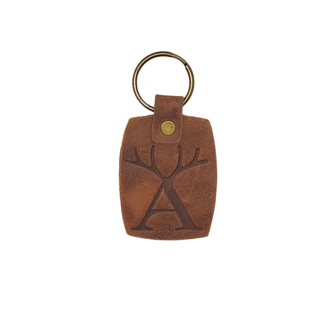 Porte-clés en cuir de bison rectangulaire avec le logo d'Artisans Canada pressé dessus