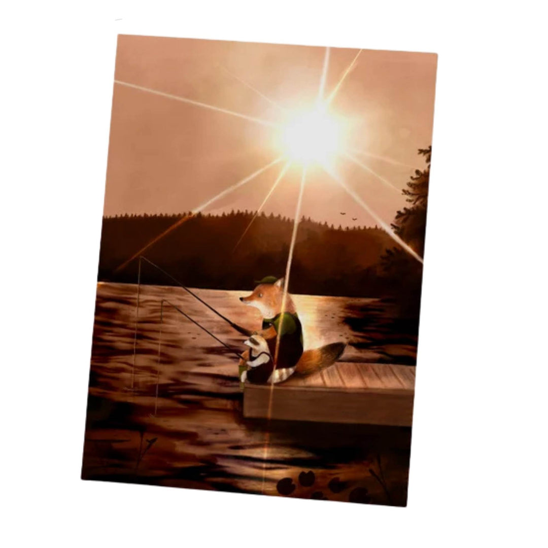 Carte de souhait avec un renard qui pêche et un coucher de soleil par Geneviève Andersen