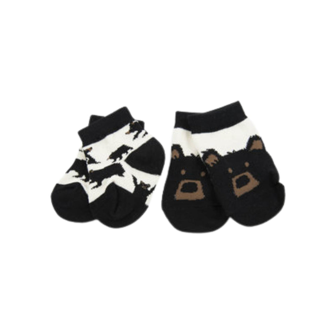 Deux paires de chaussettes pour bébé blanches avaec motifs d'ours noirs