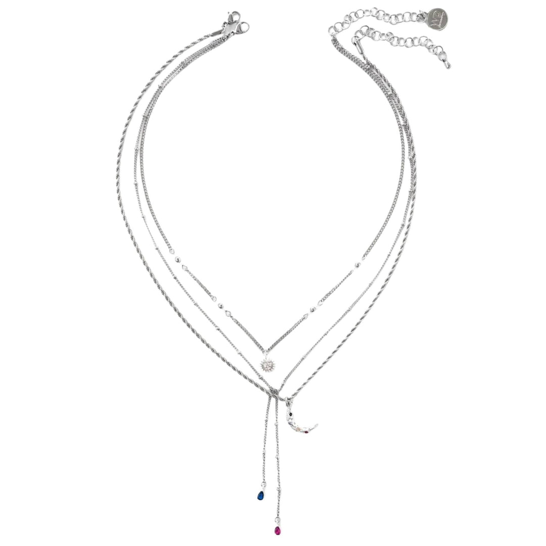 Collier à trois chaînes argentées avec pendentifs de lune, soleil et pierres bleues et rose par welldun