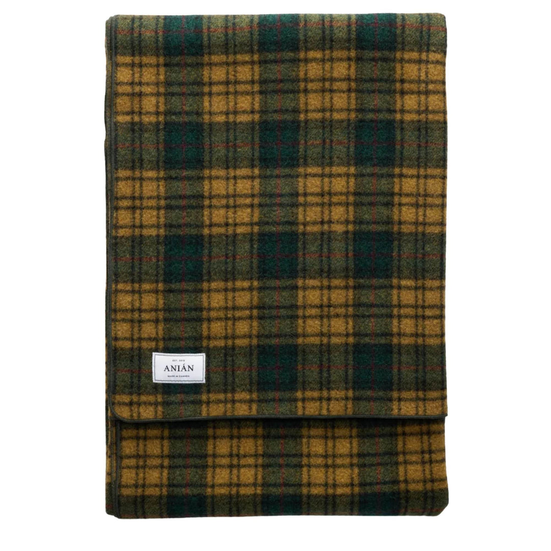 Couverture à carreaux verte et jaune par Anian vue de dessus