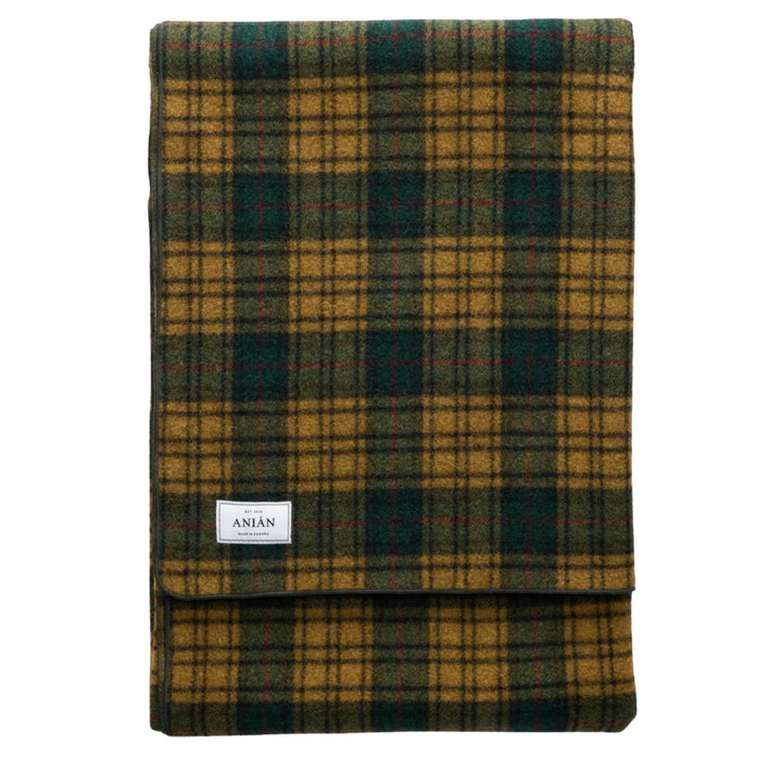 Couverture à carreaux verte et jaune par Anian vue de dessus