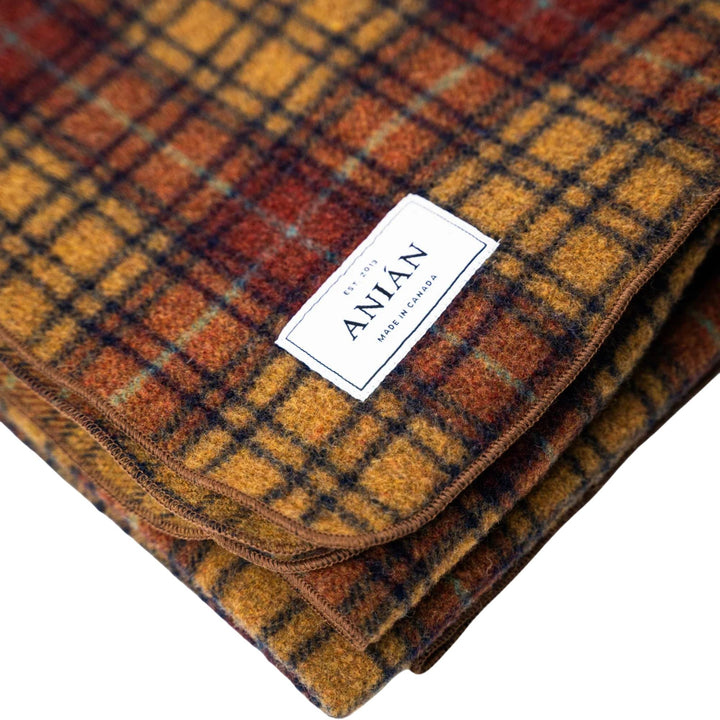 Détails de la Couverture à carreaux rouge et jaune par Anian