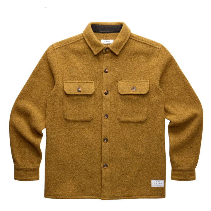 Manteau en laine couleur or par Anian vu de devant