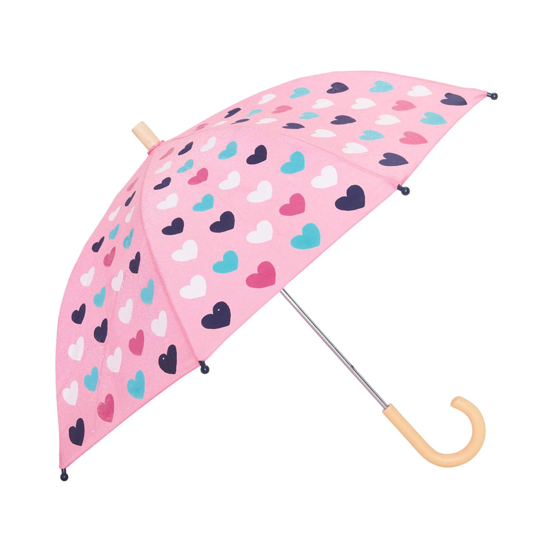Parapluie pour enfant rose avec coeurs blancs, roses, turquoises et mauves par little blue house