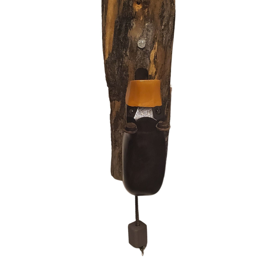 Heurtoir en bois sculpté à la main par Sculptures Tremblay en forme d'ours vu de face