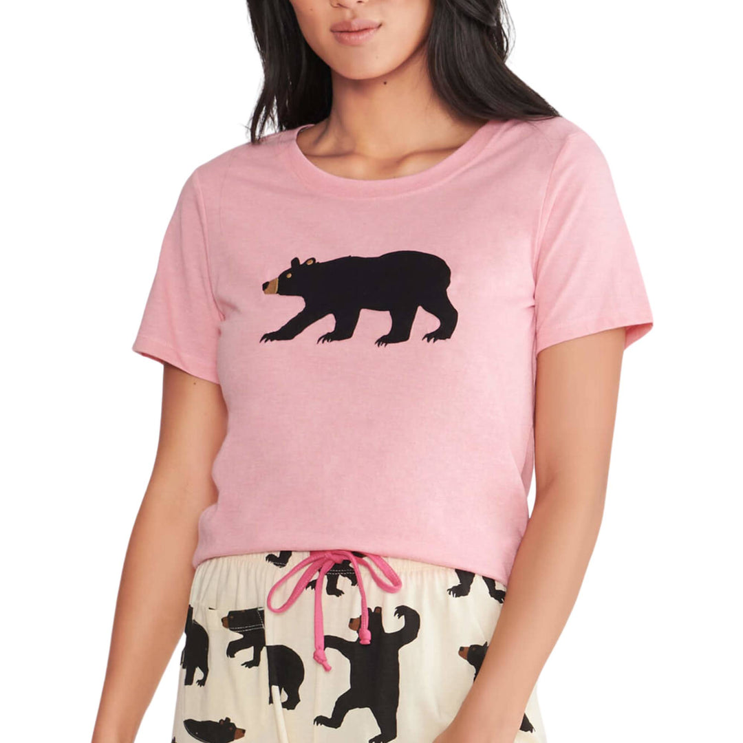 Haut de pyjama rose avec un motif d'ours noir