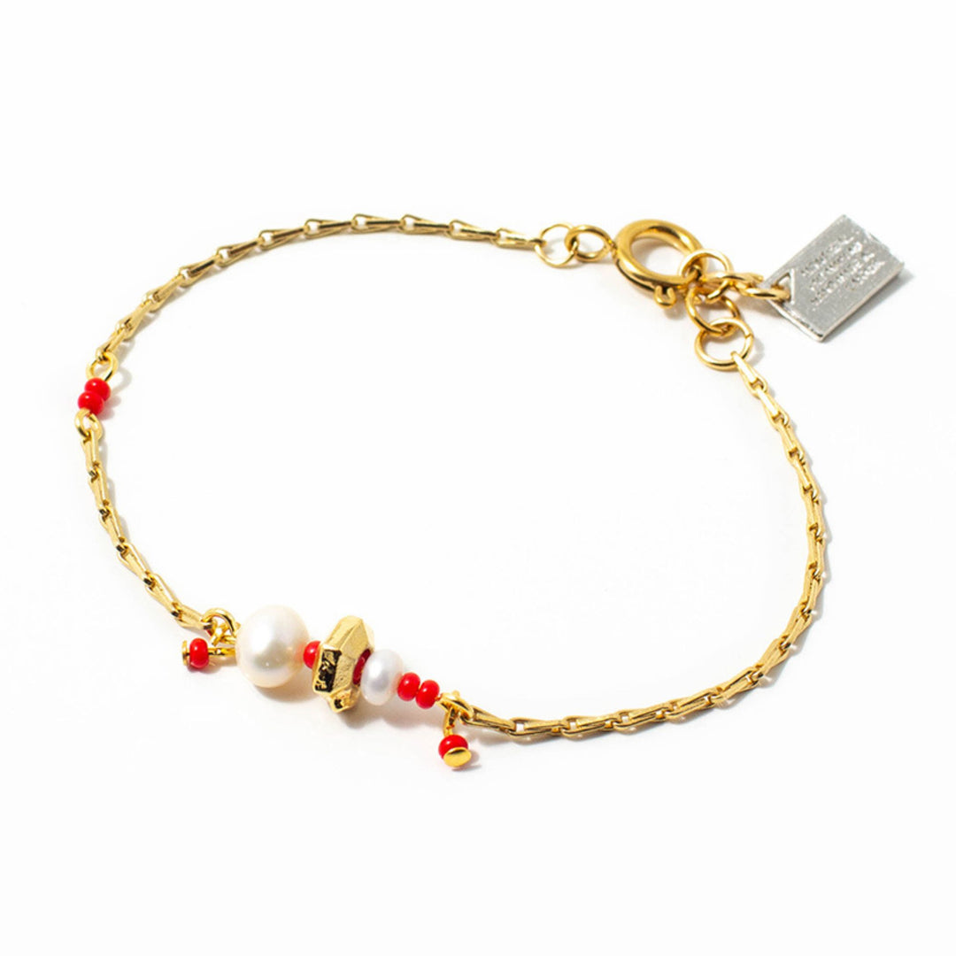 Bracelet Anne-marie Chagnon Arlo doré avec pierres rouges et blanches