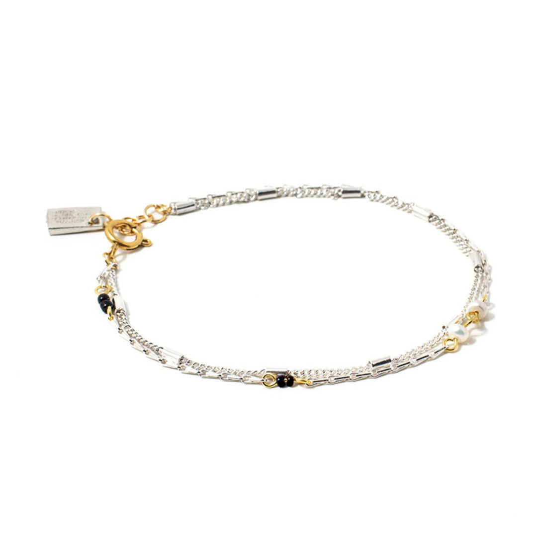 Bracelet pour cheville Anne-Marie Chagnon Fioz argenté avec pièces dorées et perles noires