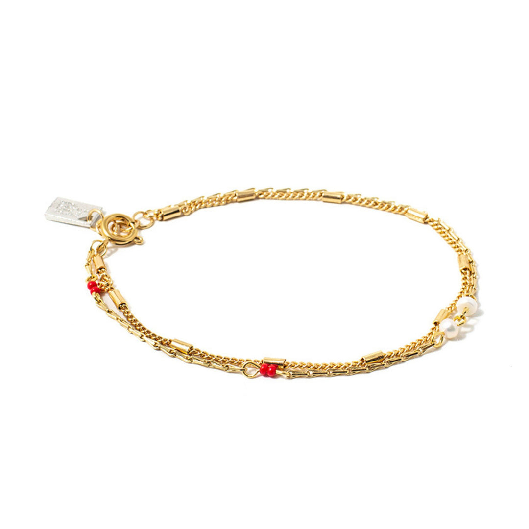 Bracelet pour cheville Anne-Marie Chagnon Fioz doré avec pierres rouges