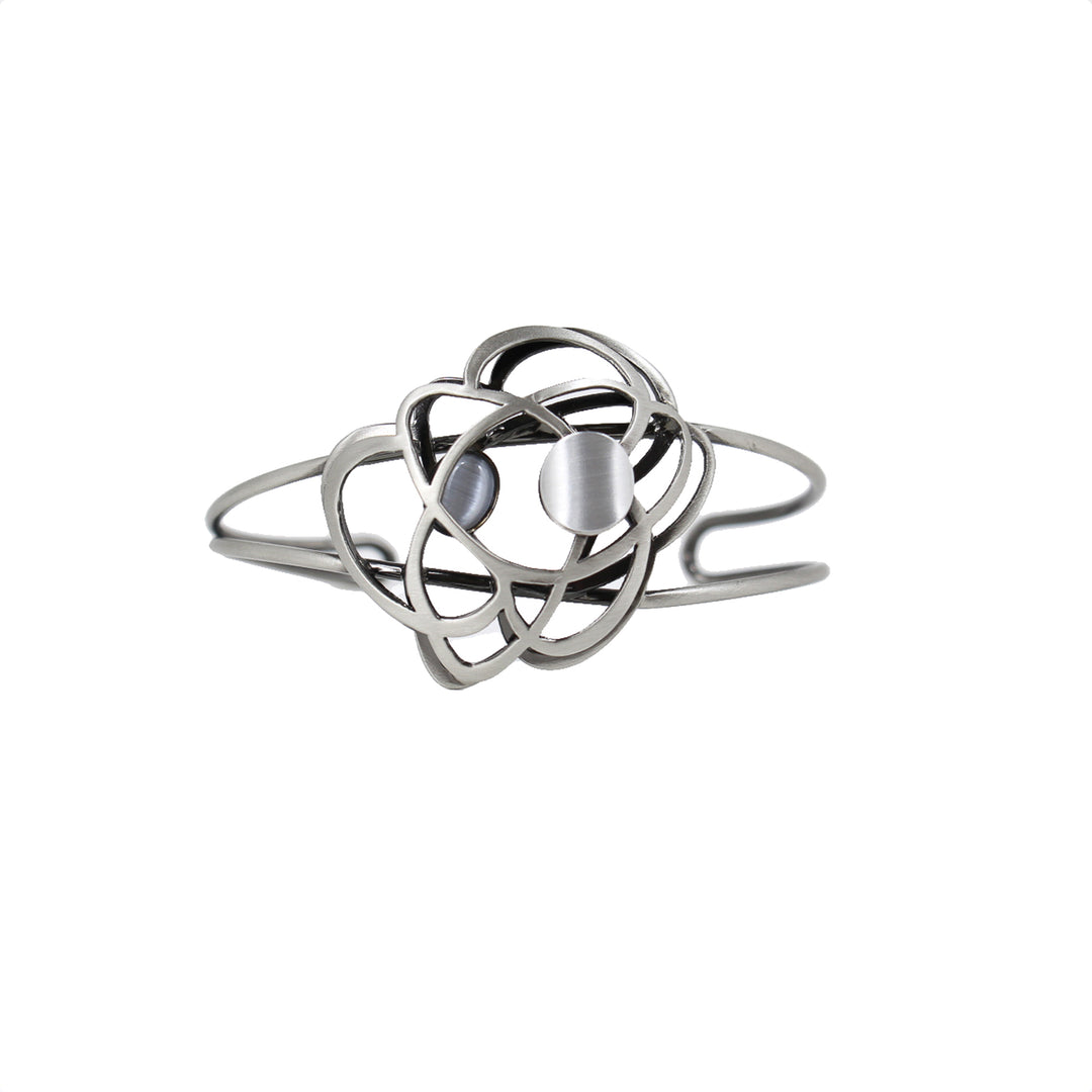 Bracelet ridige argenté avec formes abstraites et pierres grises