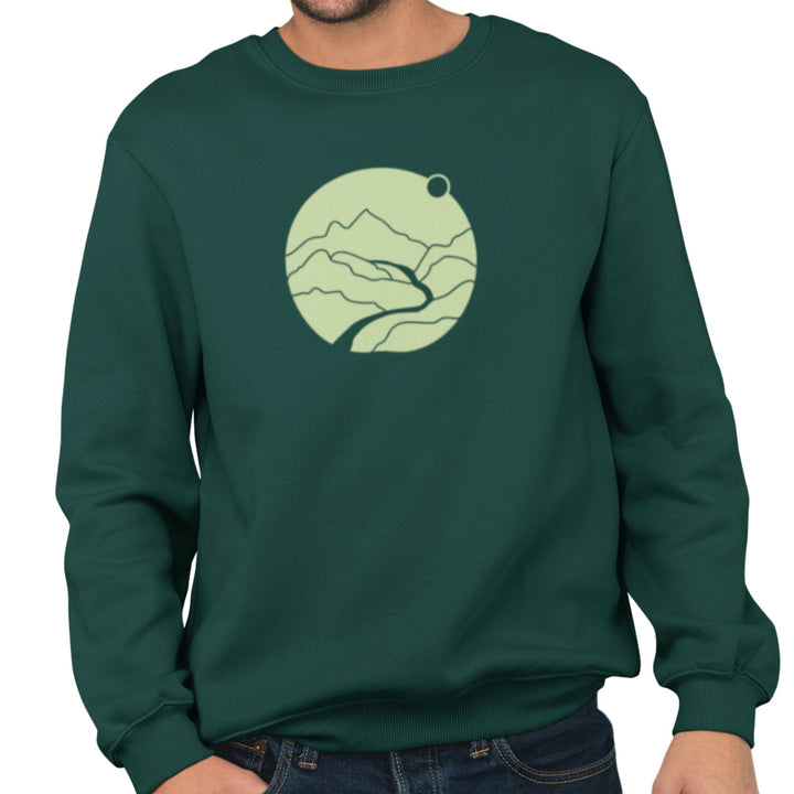 Personne portant un coton ouaté KM54 vert avec un motif de montagnes et rivière en vert