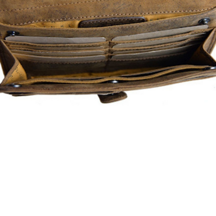 Intérieur d'un sac organisateur à glissière en cuir de bison ouvert sur ses compartiments